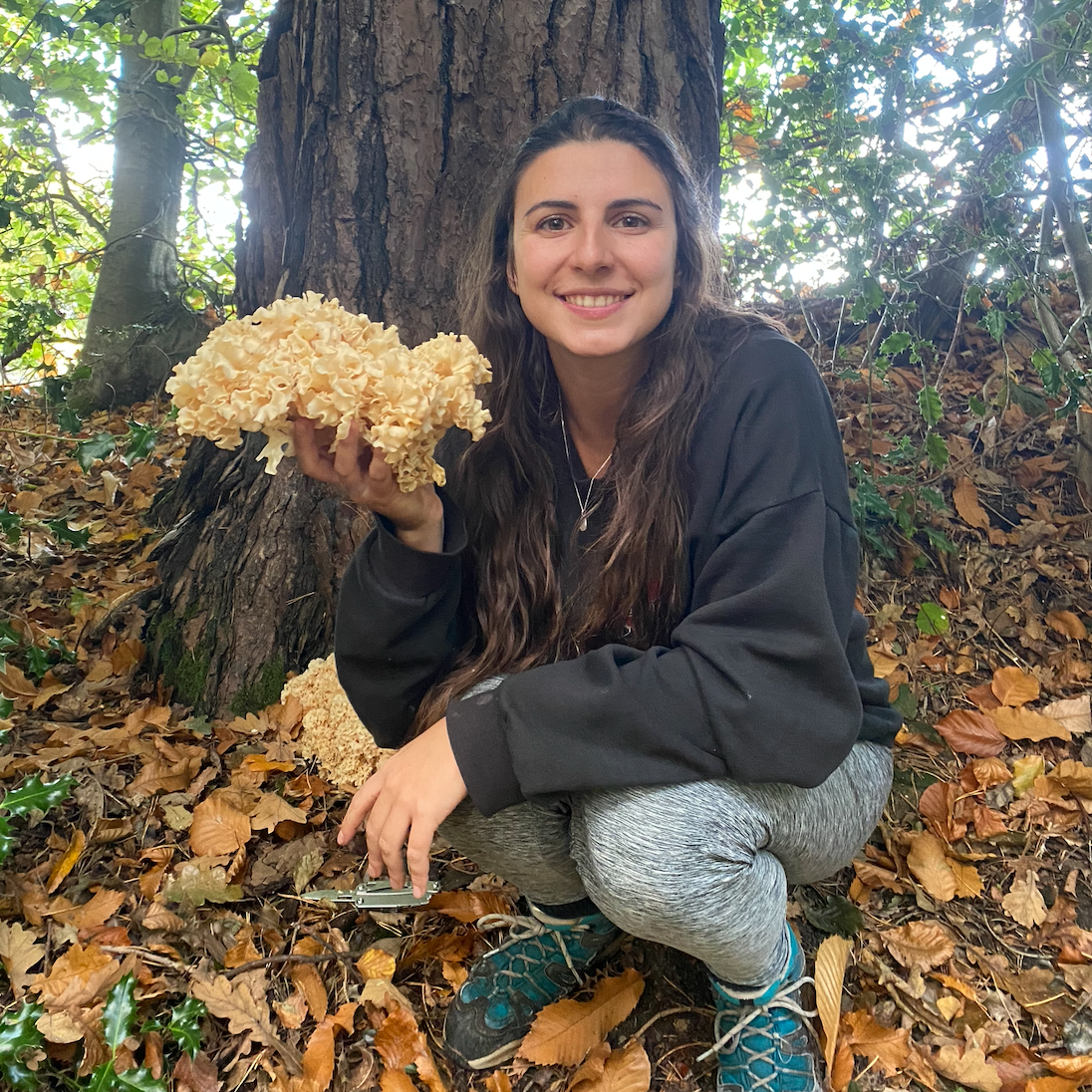 Celia Alonso, the author of the page, holding a cauliflower mushroom